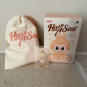 Pop Mart “Have A Seat” Labubu: Sisi💛